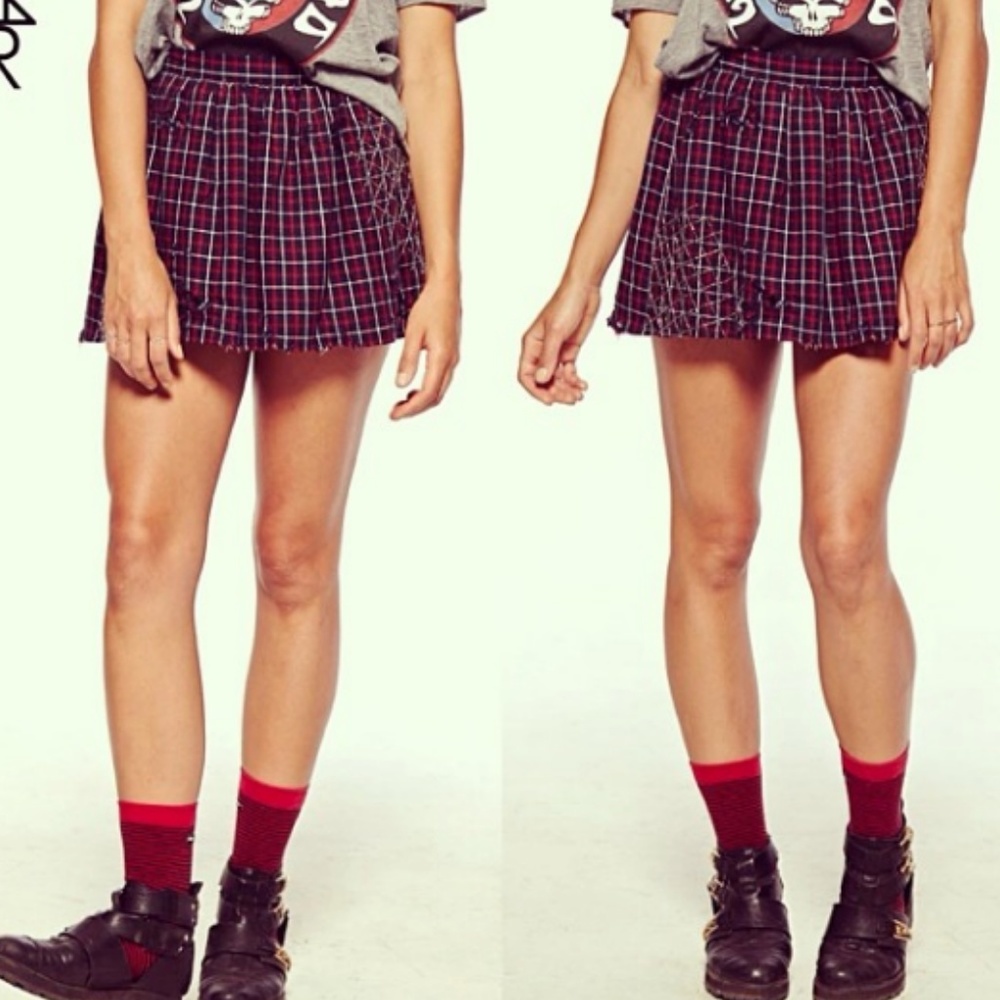 Chaser Beaded and distressed plaid skirt